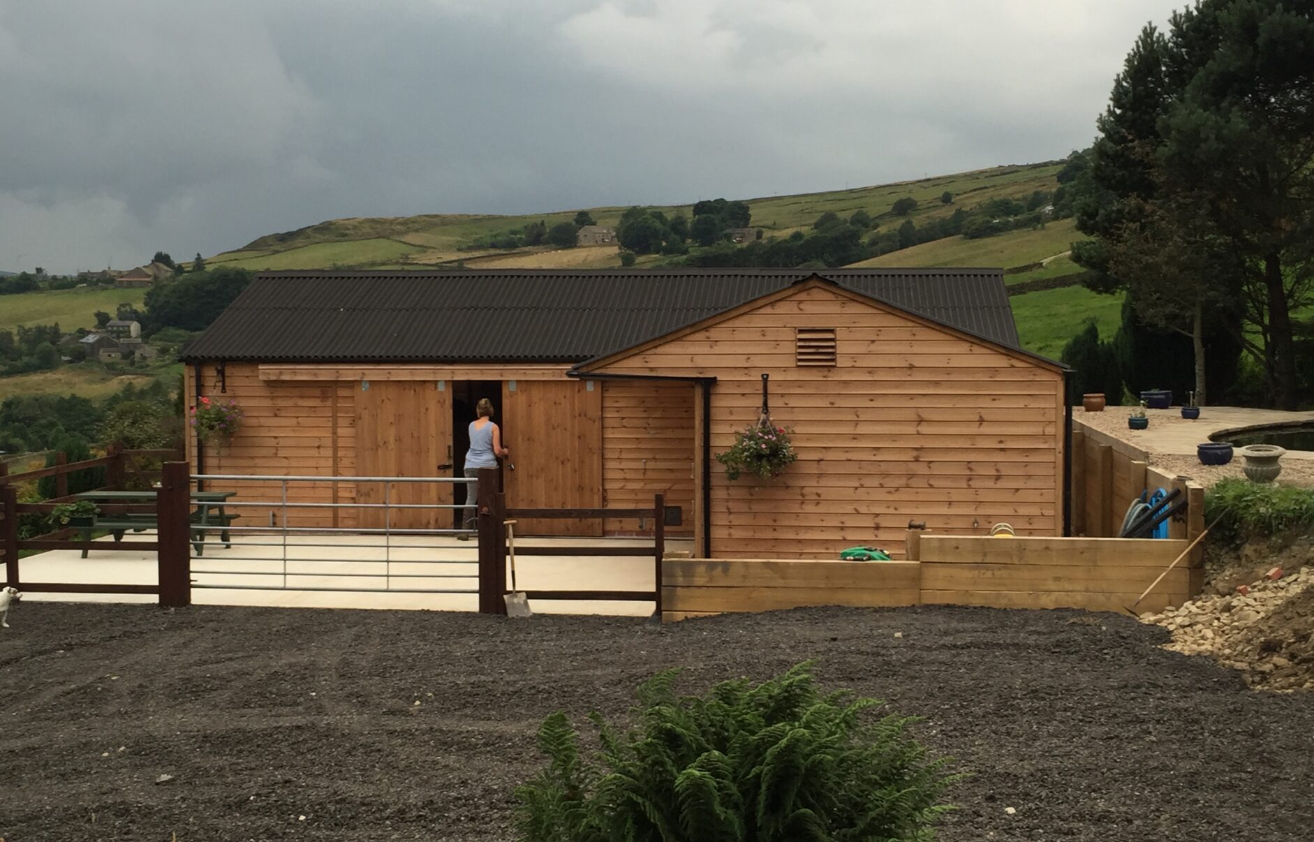 american barn with client entering through sliding doors