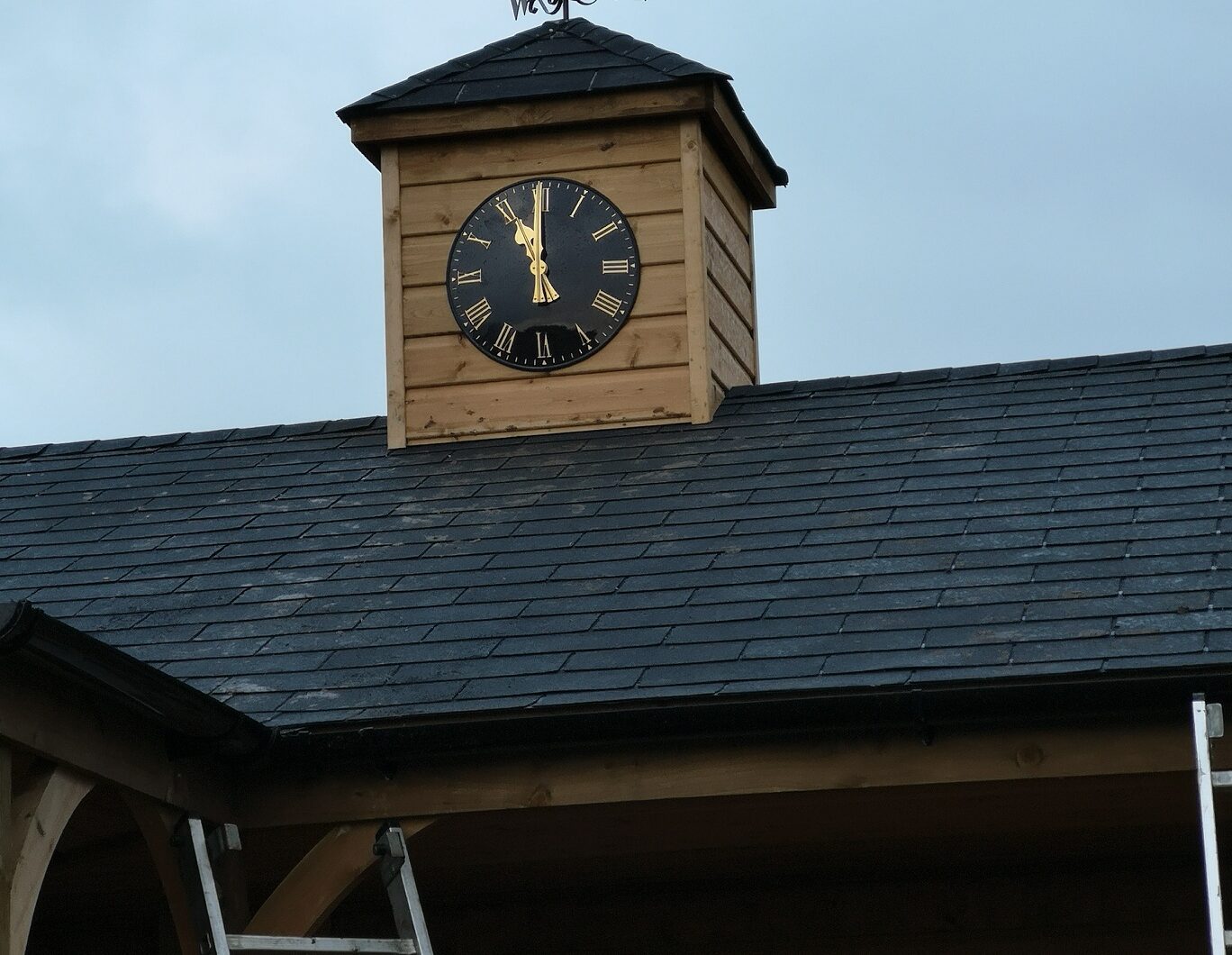 Clocktower with felt shingle and weathervene