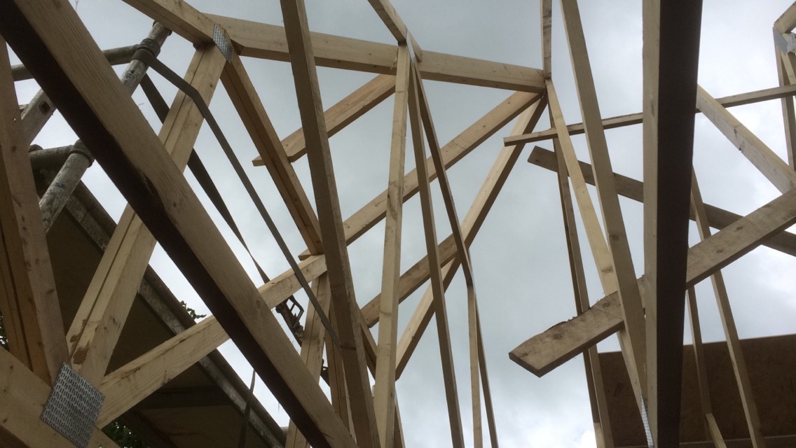 Hip barn truss roof from internal under construction