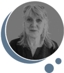 Headshot of Sarah with abstract slate blue bubbles