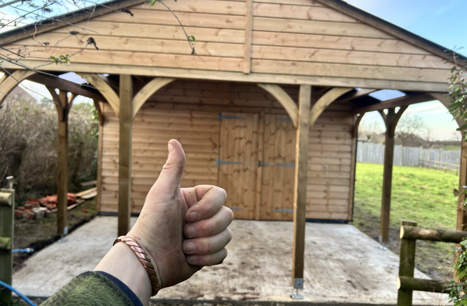 Thumbs up, showing covered area