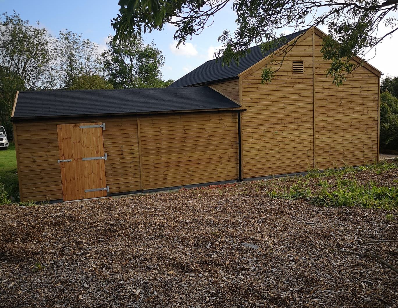 Bespoke Stable and Barn with Felt Shingles backside door