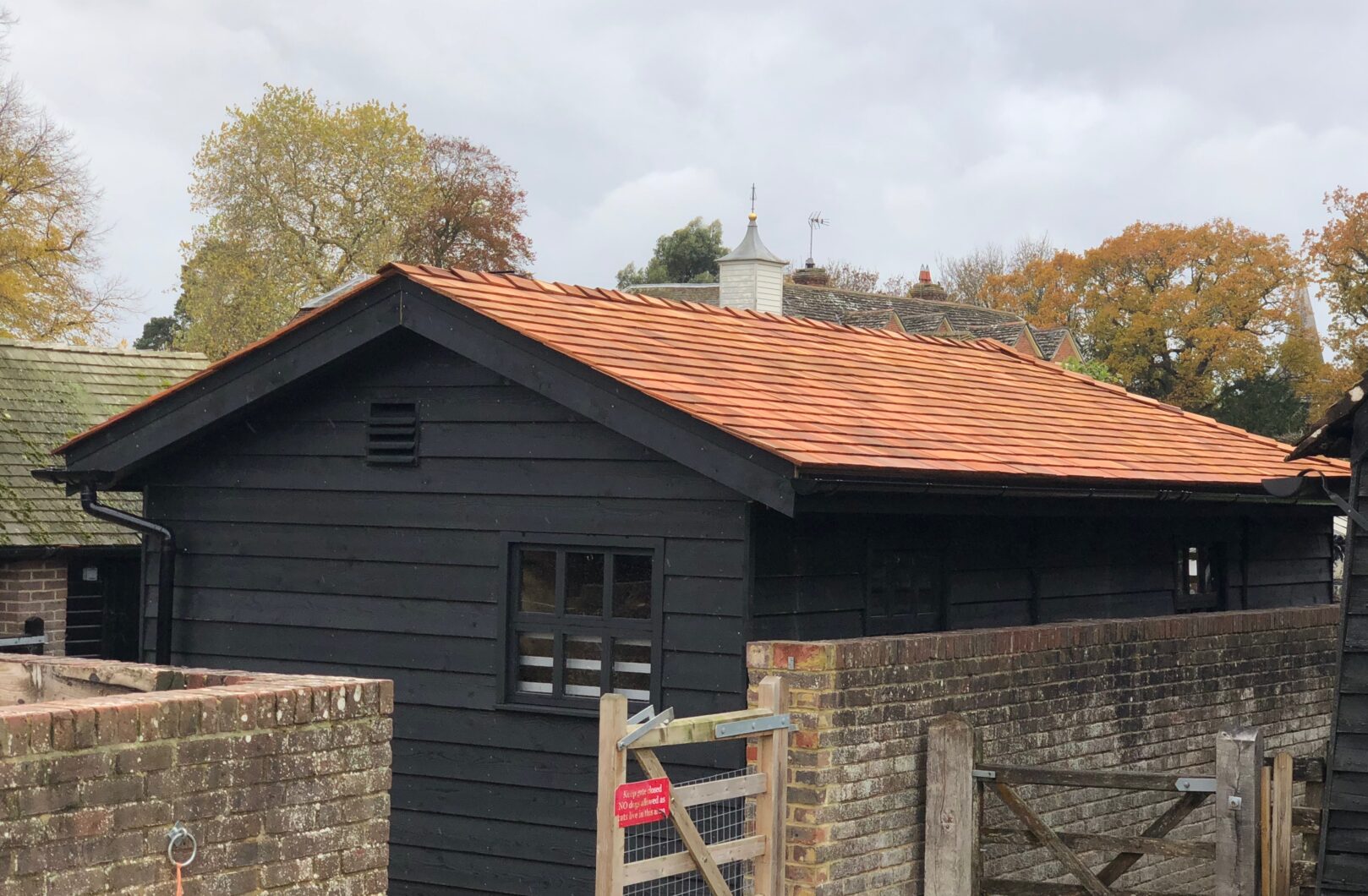 Compact L-Shape Stable Block Painted with Cedar Shingles