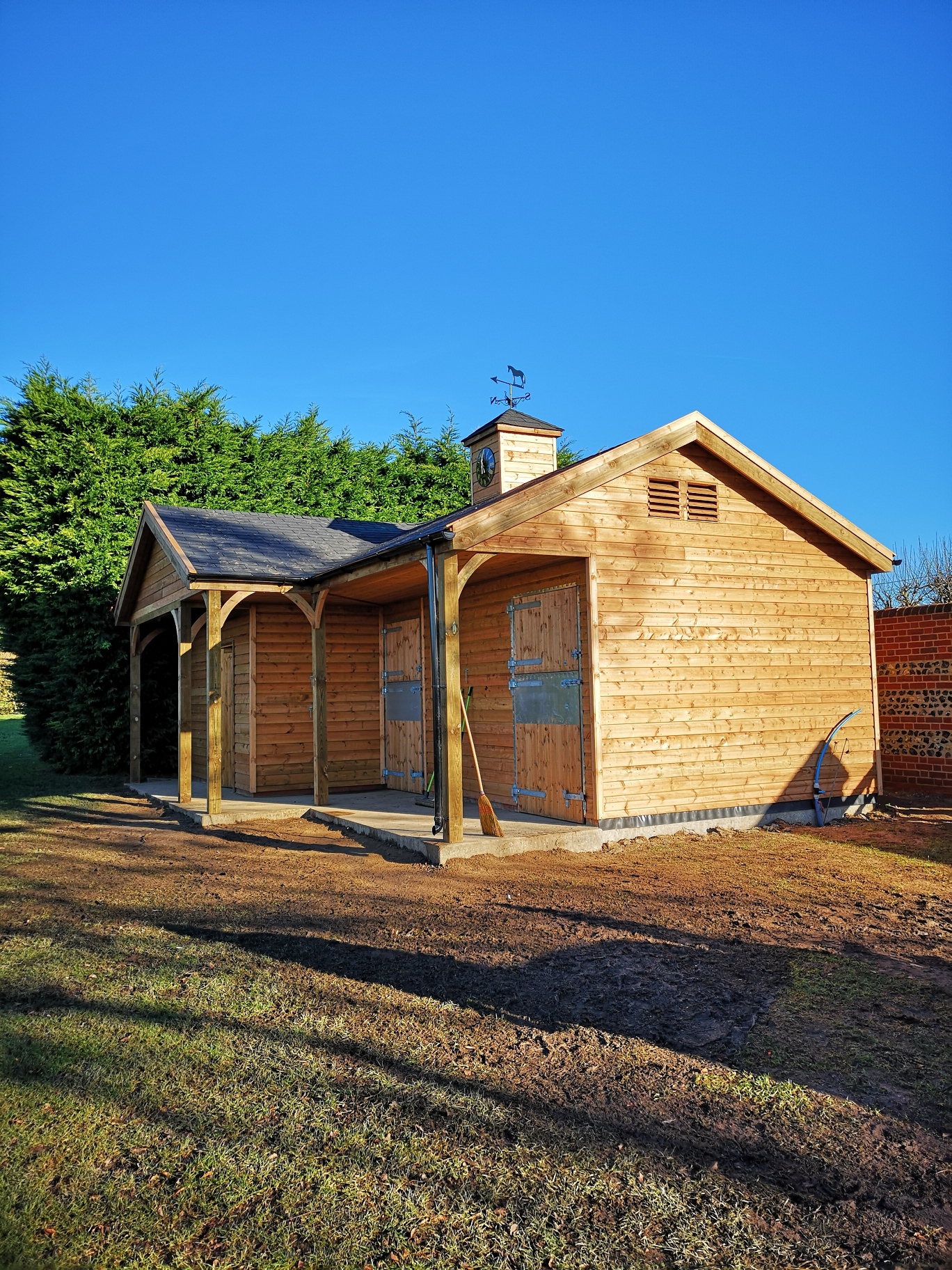 Compact L-Shape Stable Block with Clocktower