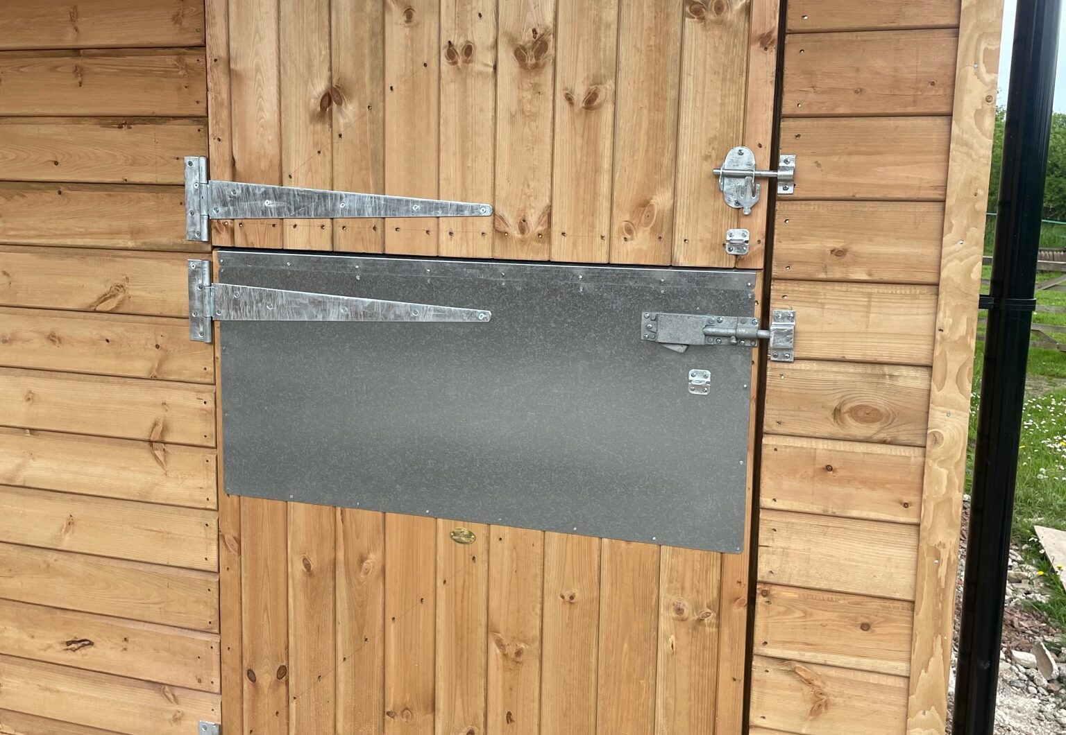 Door with extra deep bottom door protection