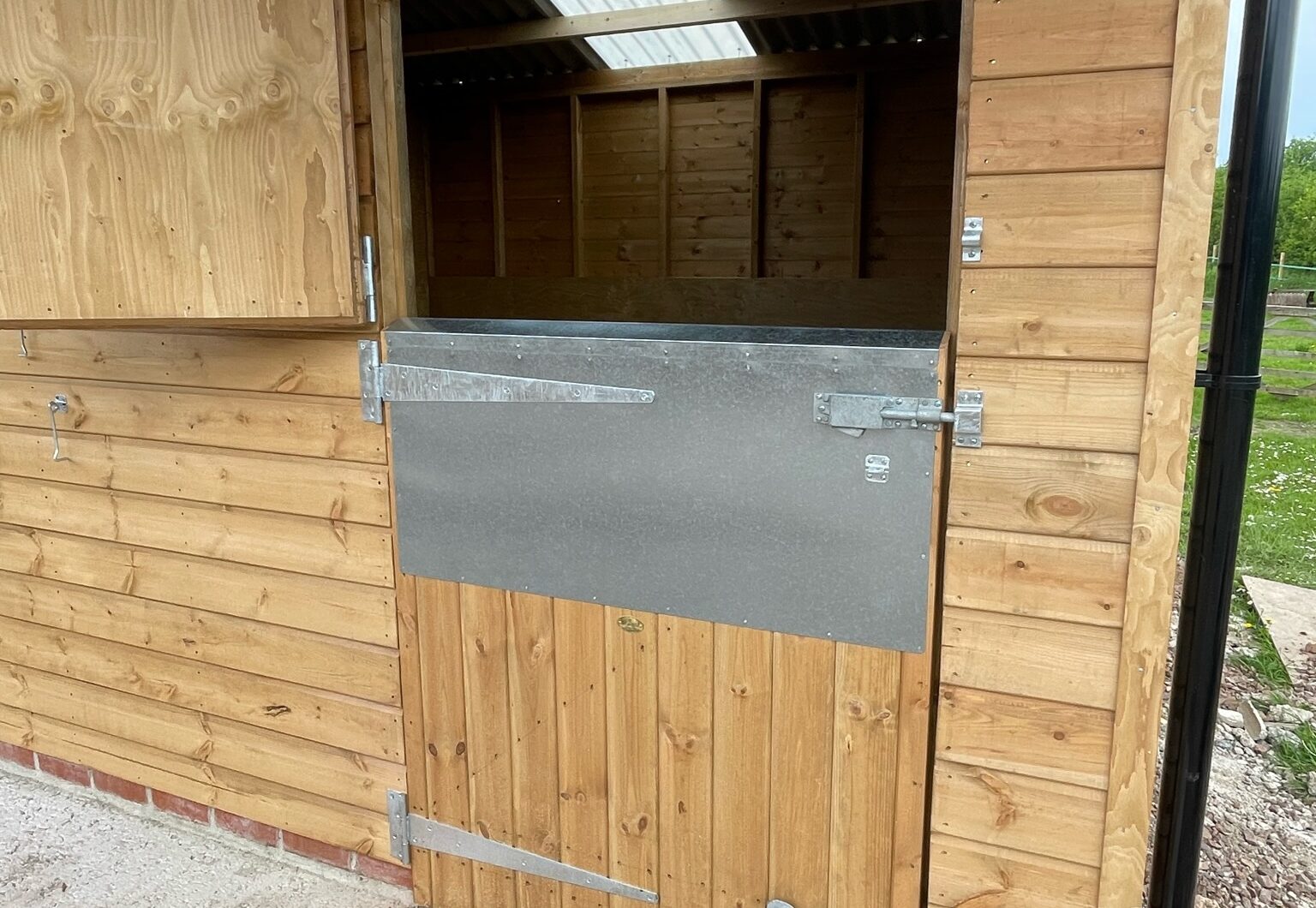 Door with extra deep bottom door protection open