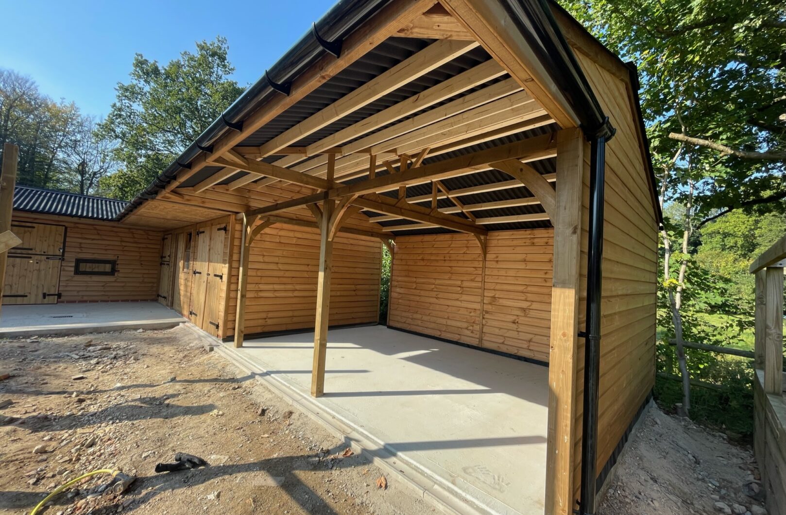 Covered walkway next to stables