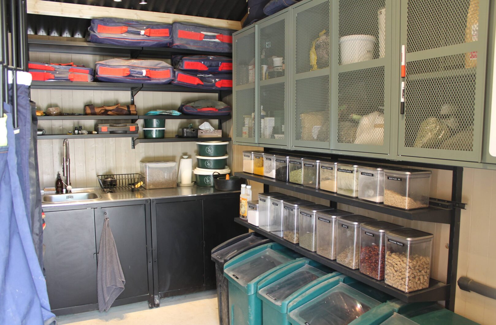 Internal feed room, decked out with feed and equipment