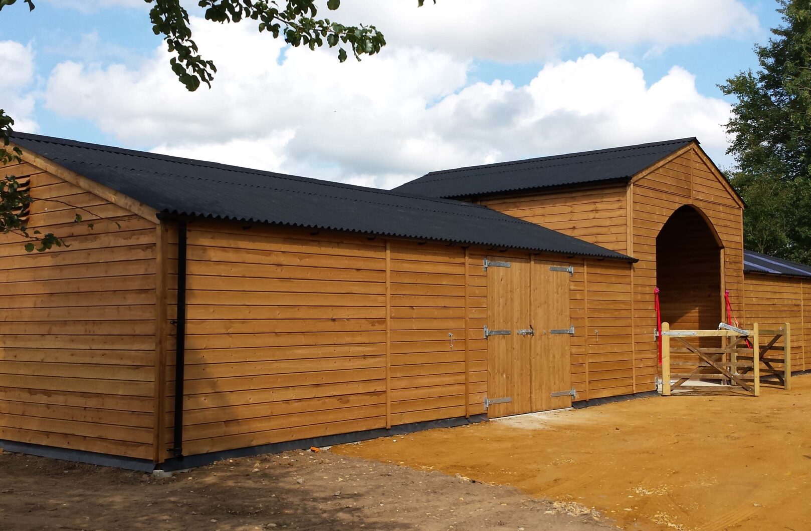 Back side of L-Shape Stable Block with Ride Through Archway