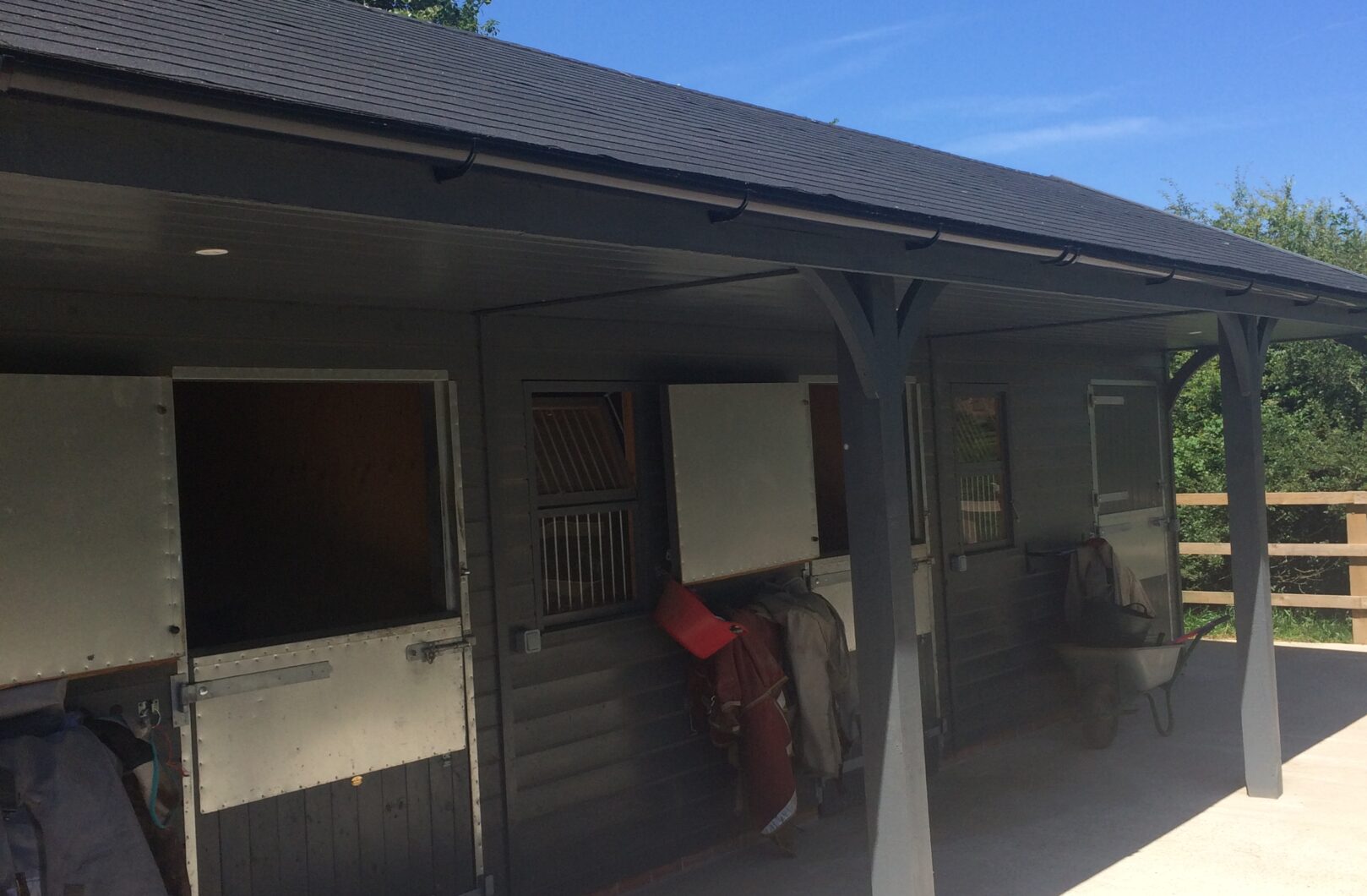 Stable front with top doors open