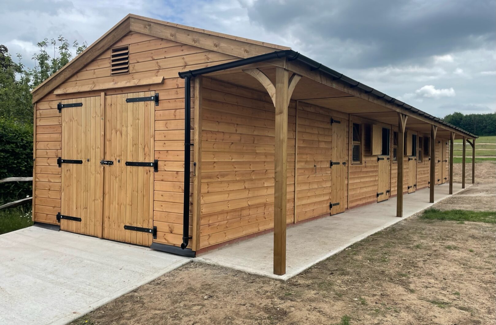 Double barn doors with black ironmongery