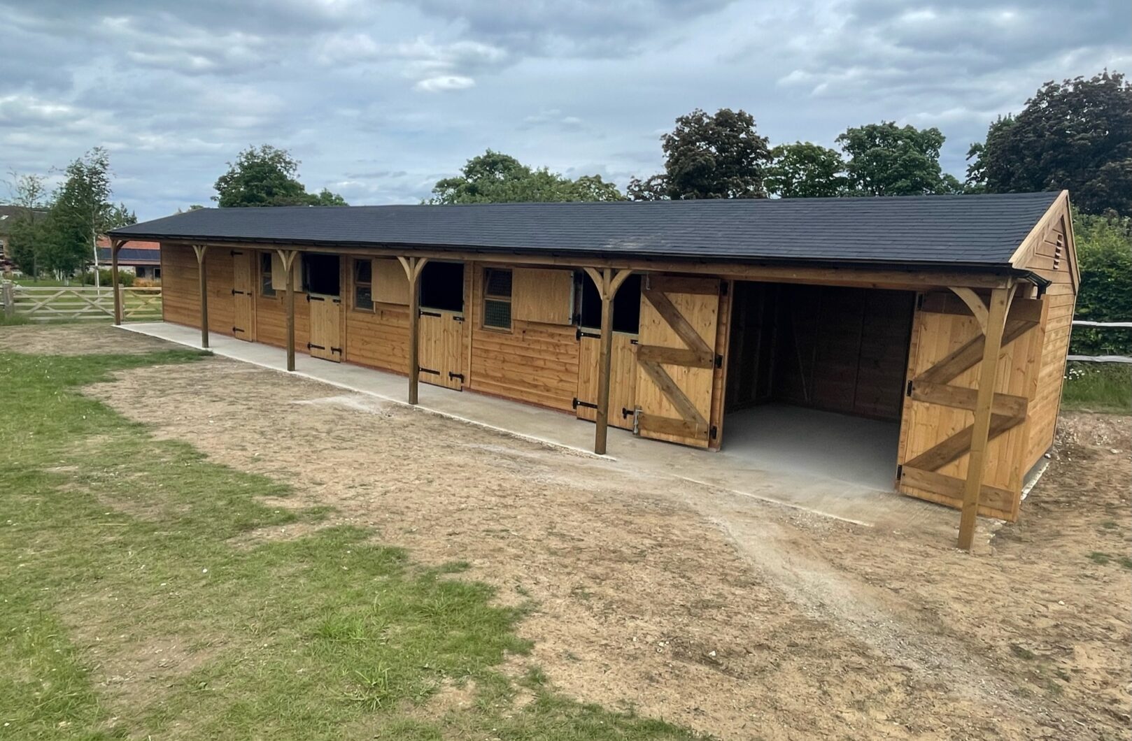 Long Stable Block with Black Ironmongery and Felt Shingles open