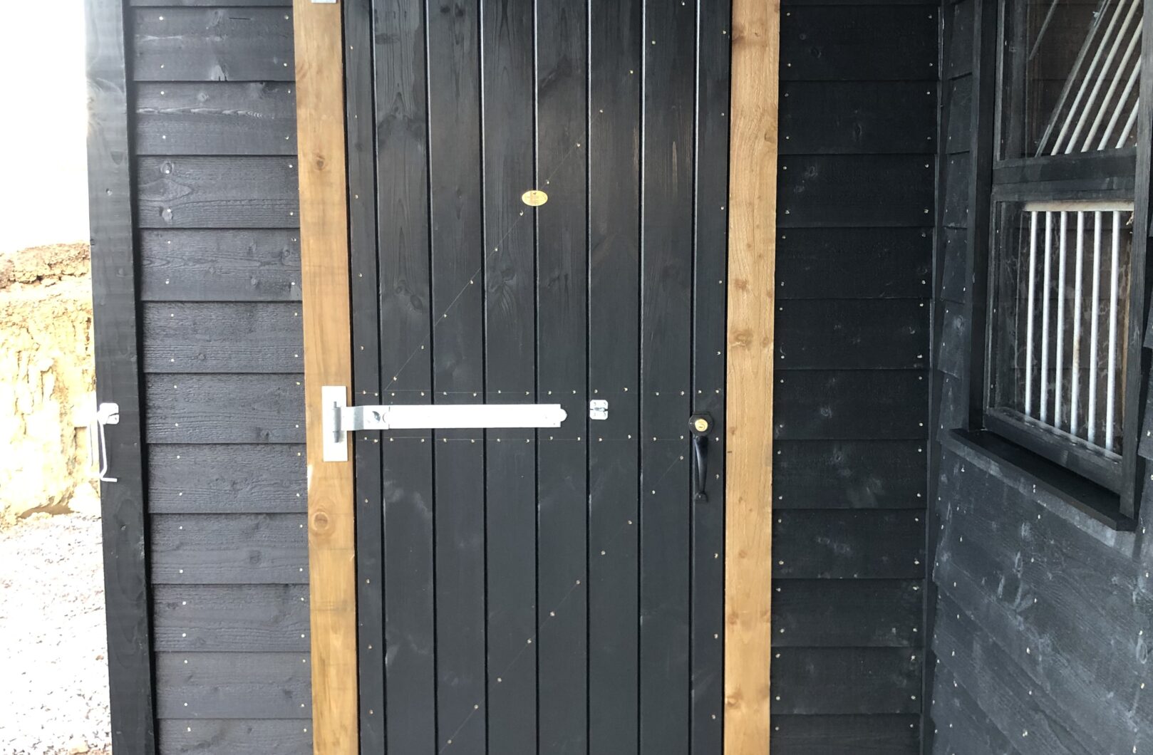 Black tack room door