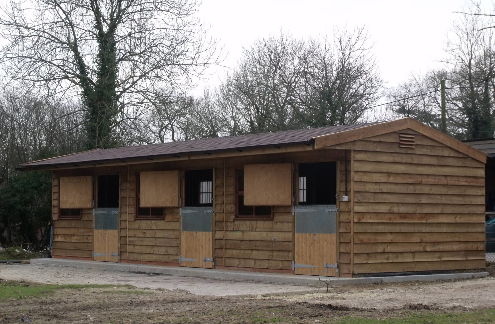Stable Block with Featheredge Cladding and Felt Shingles open