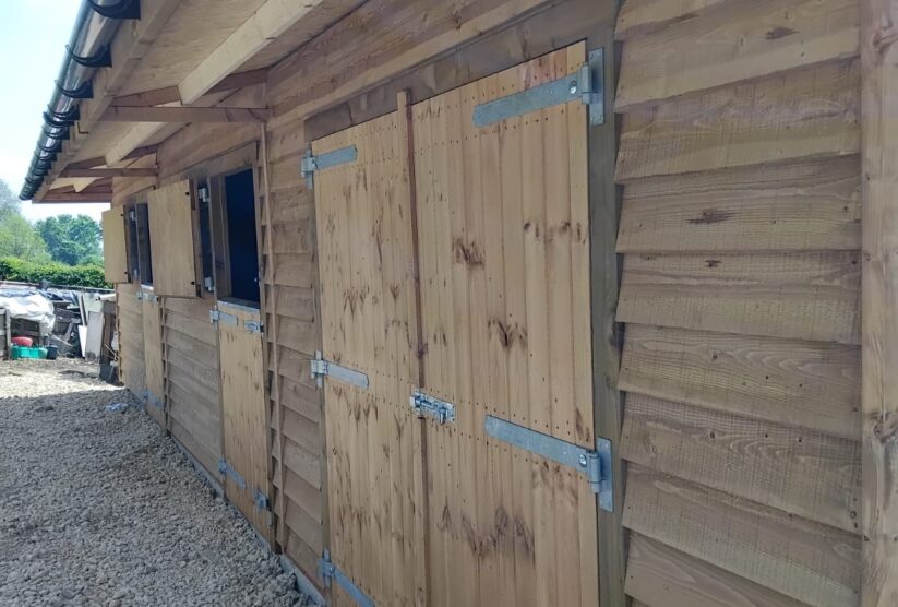 Barn doors and stable front close up