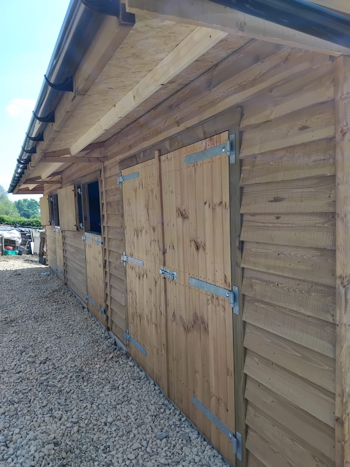 Barn doors and stable front close up