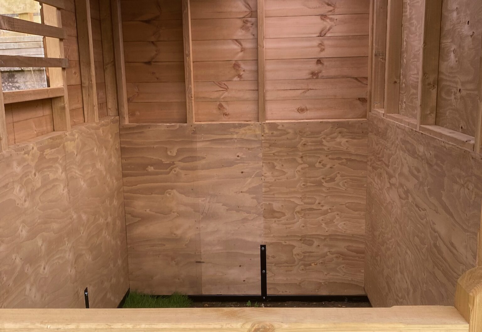 Dinkey donkey shelter interior, clear roof sheet and sliding perspex window