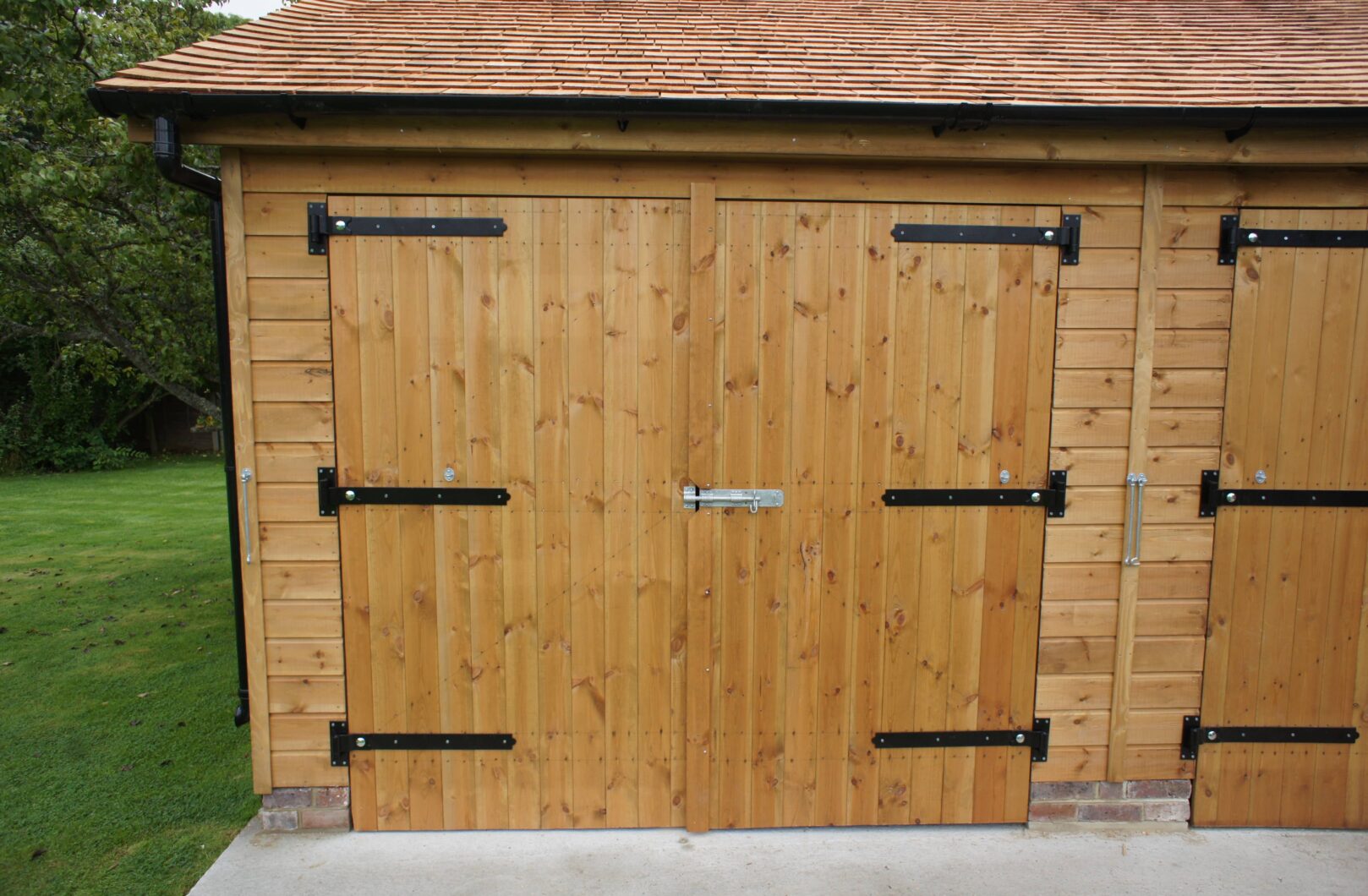 Barn door with black ironmongery