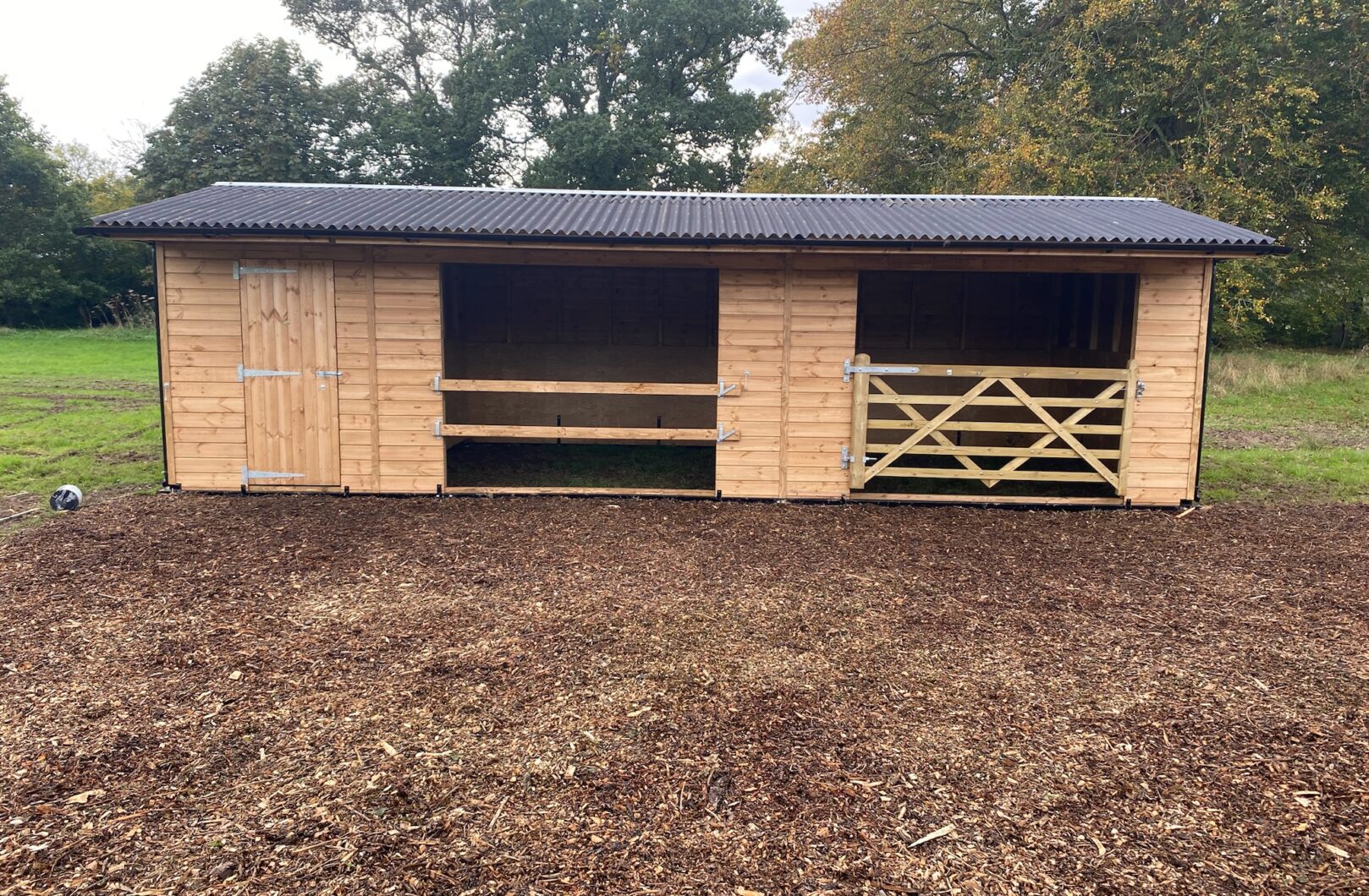 Double Mobile Field Shelter and Tack Room with Gates and Slip Rail front elevation