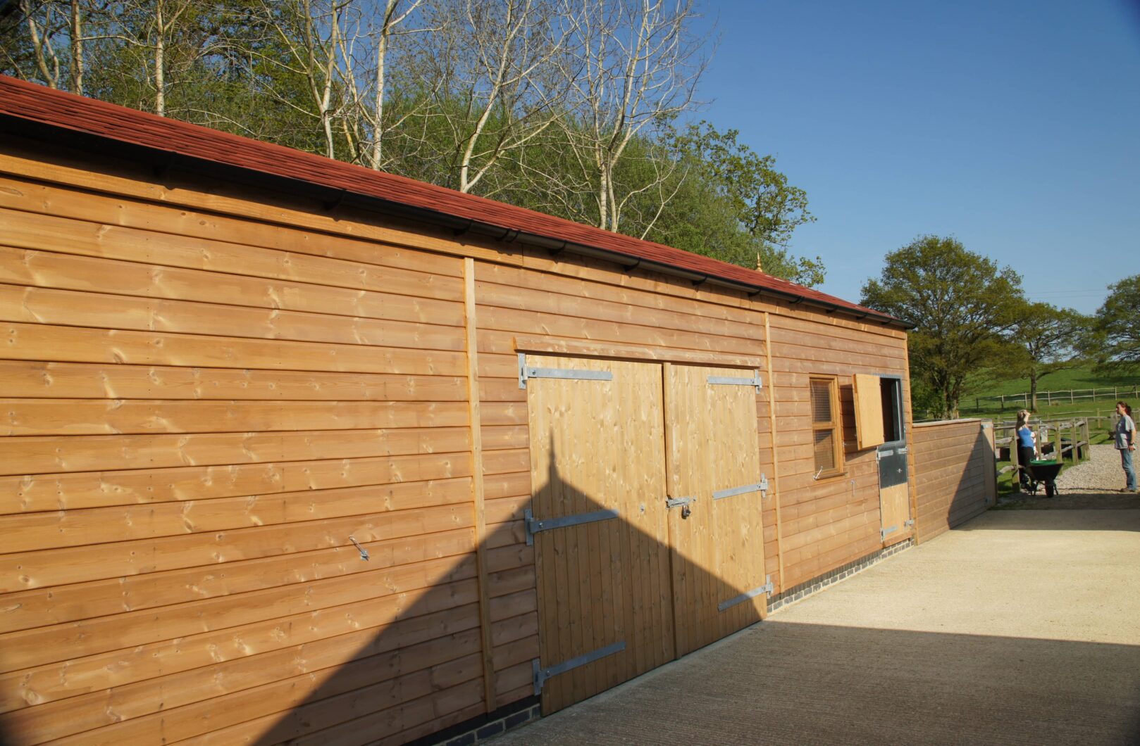 Garage and Stable with Red Shingle