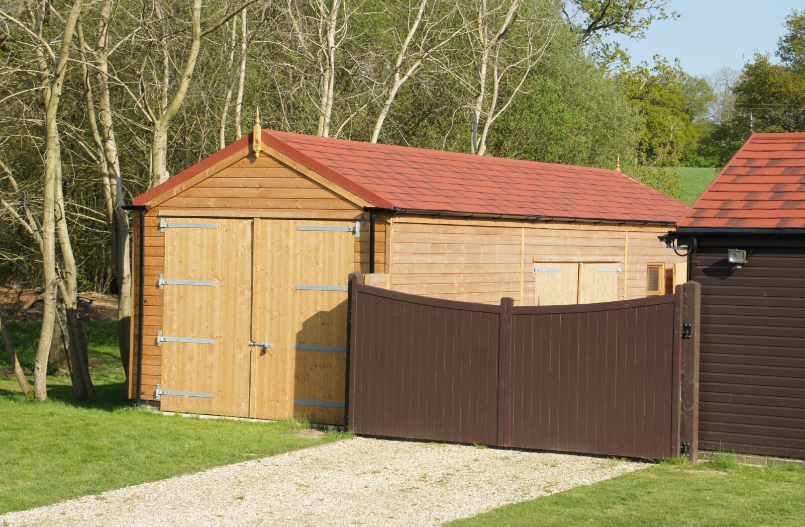 Garage and Stable with Red Shingle