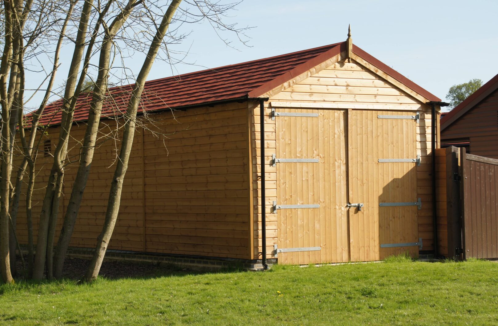 Garage and Stable with Red Shingle barn doors