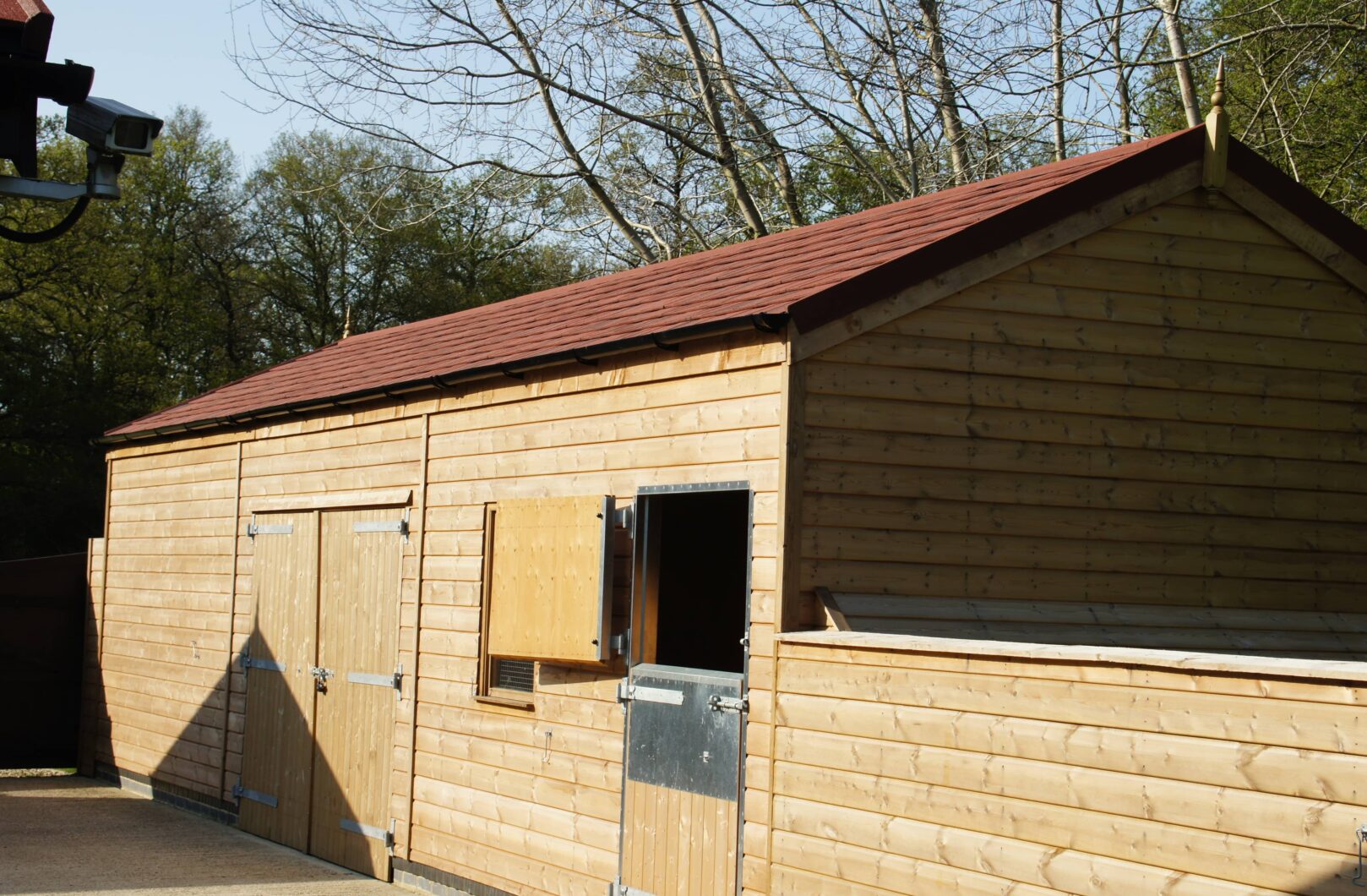 Garage and Stable with Red Shingle