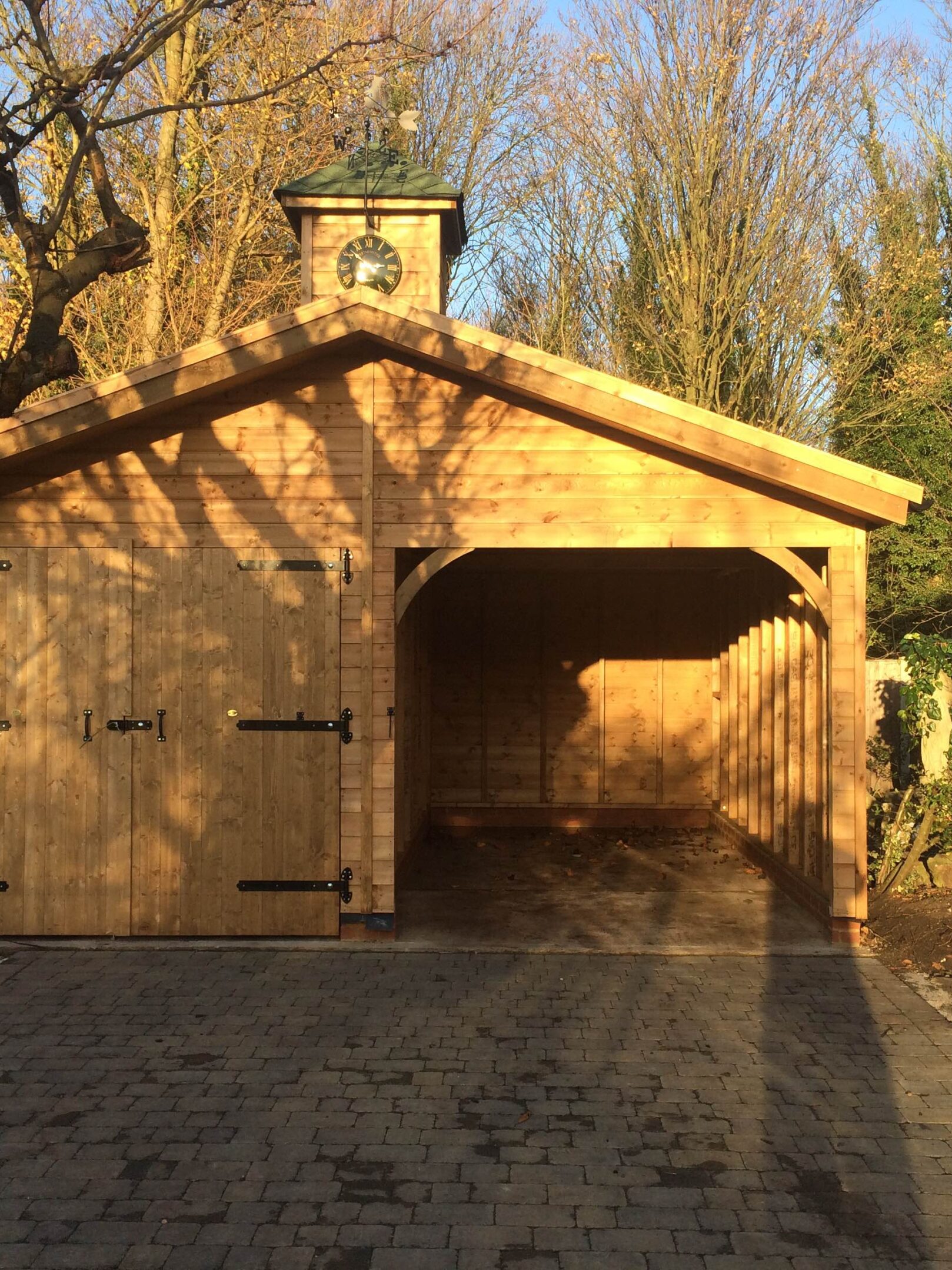 Garage with Open Car Port and Clocktower