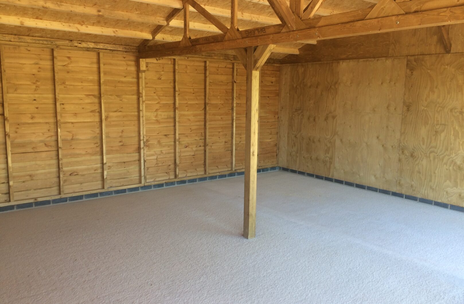 Internal with support post on truss