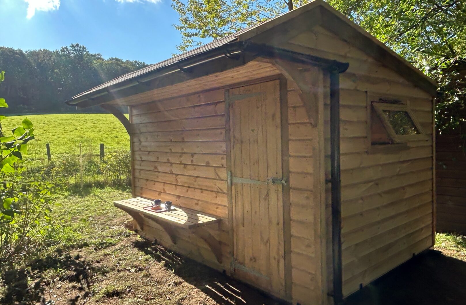 Mobile Sauna Shell with tea on bench