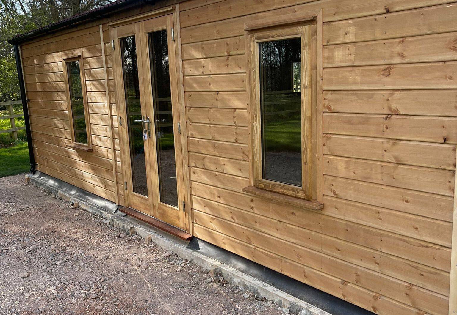 Front of office with casement windows and double glazed door