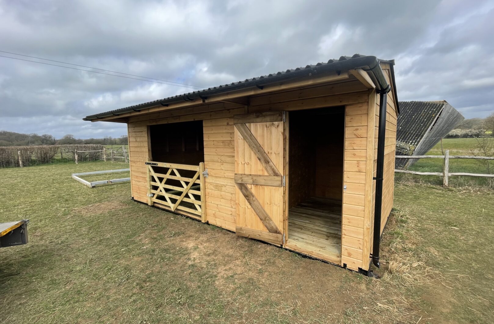 Single Mobile Field Shelter and Tack Room with Gate open