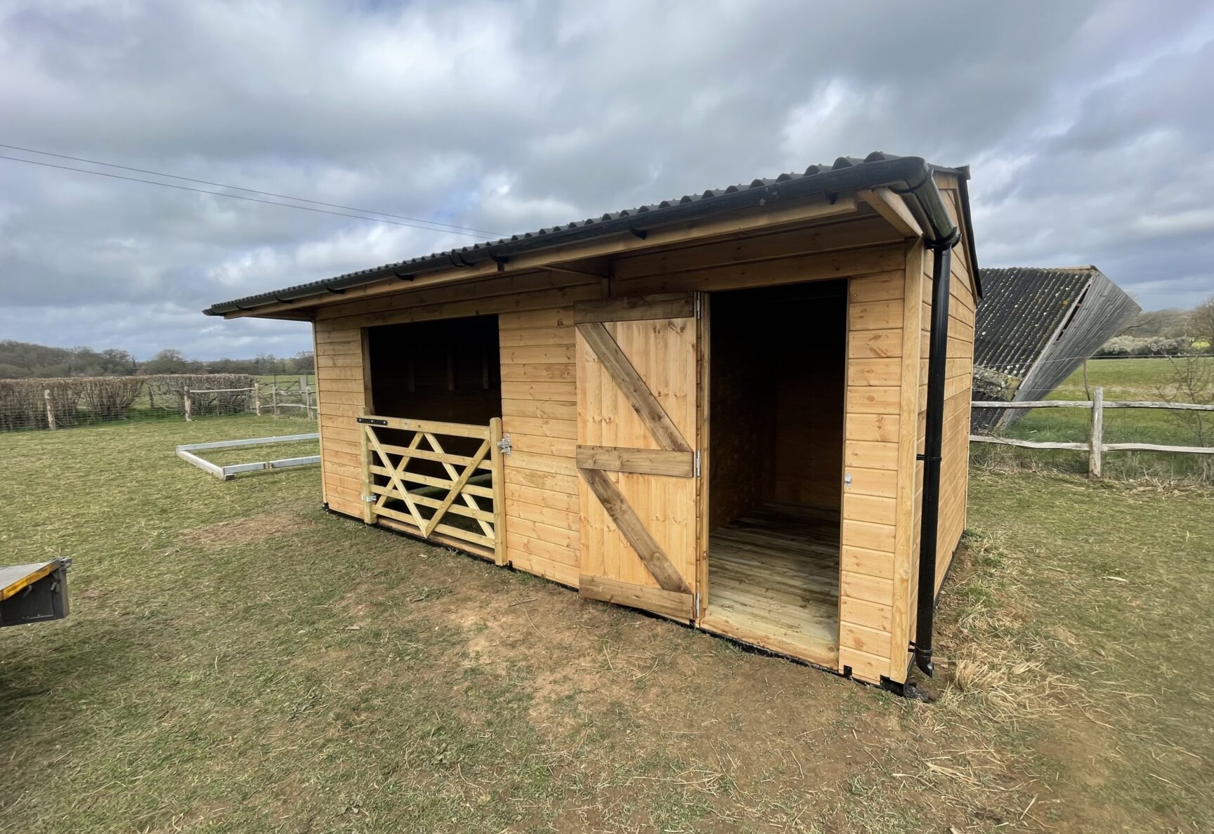 Single Mobile Field Shelter and Tack Room with Gate open