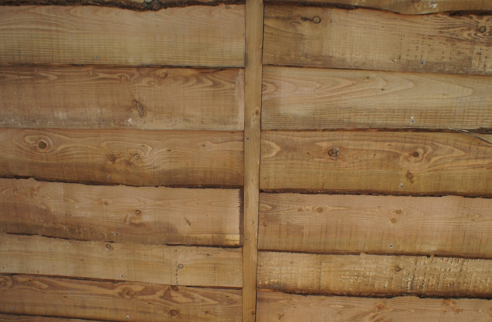 Waney edge cladding back side