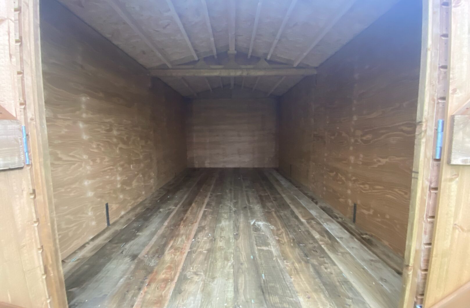 Internal of workshop with timber floor and fully lined to eaves.