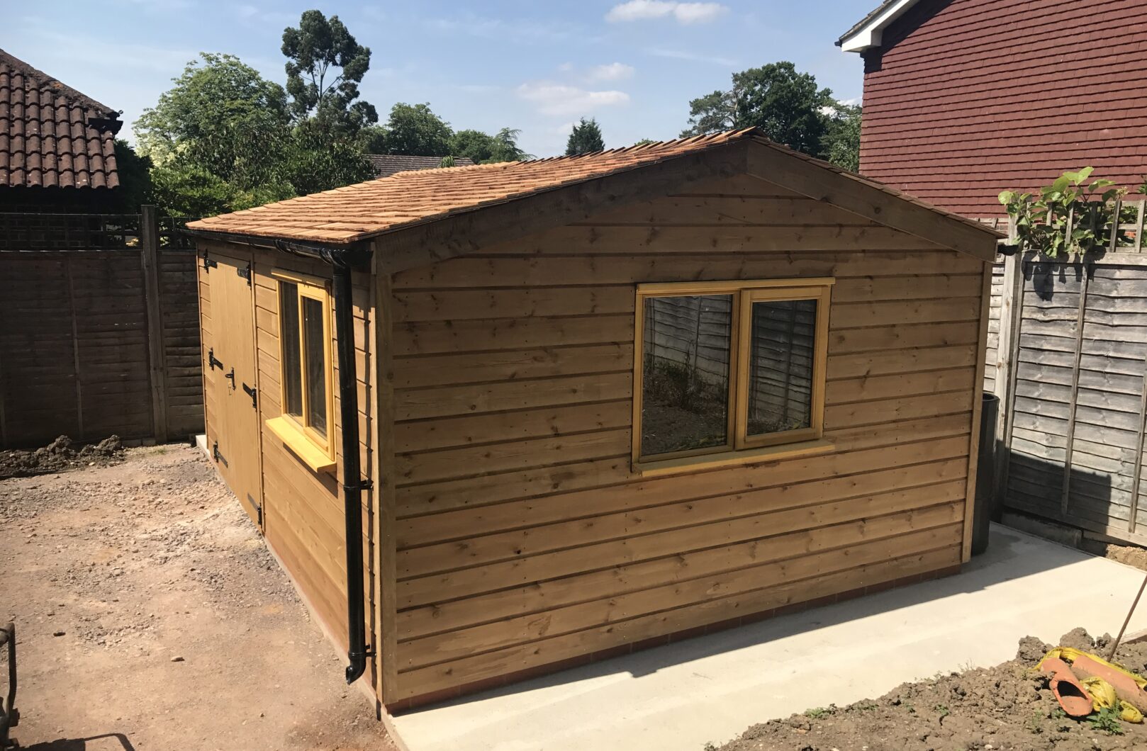 Workshop with Black Ironmongery and Cedar Shingles