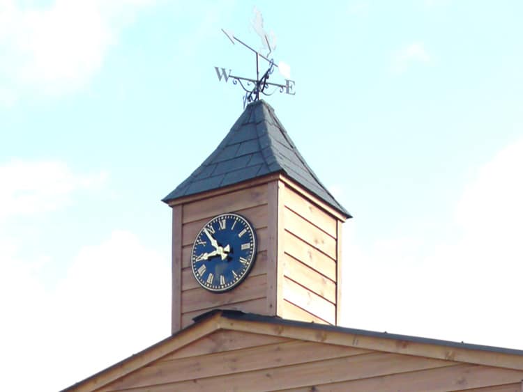 listed building with a clock