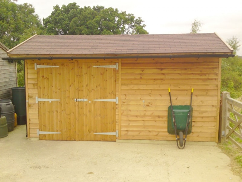 hay barn with wheel barrow